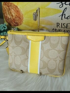 Coach Beige Signature Canvas Wristlet with Yellow Stripe